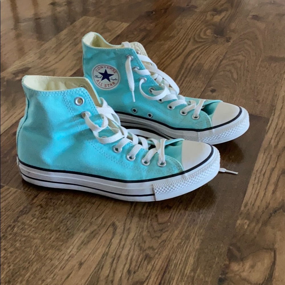 Light blue high top converse